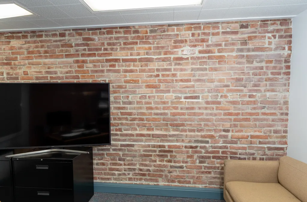 Service Linen Supply Brick Wall After Tuckpointing Service Linen Supply Brick Wall After Tuckpointing