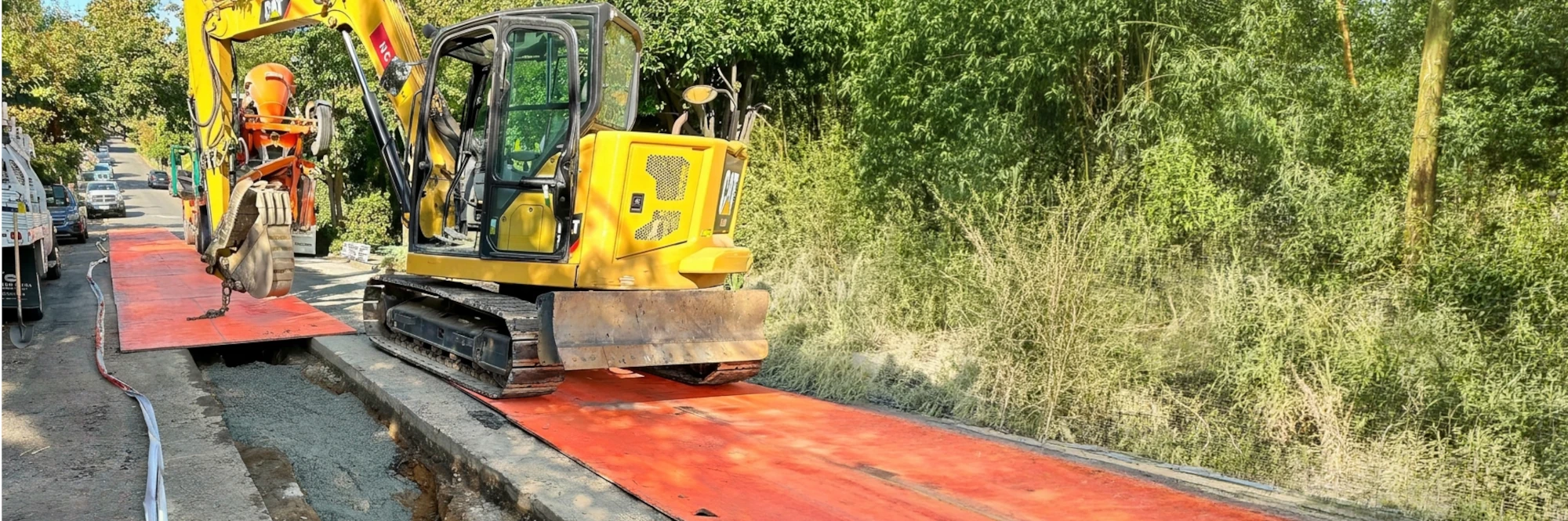 Backfilling a new underground power line trench in Seattle.